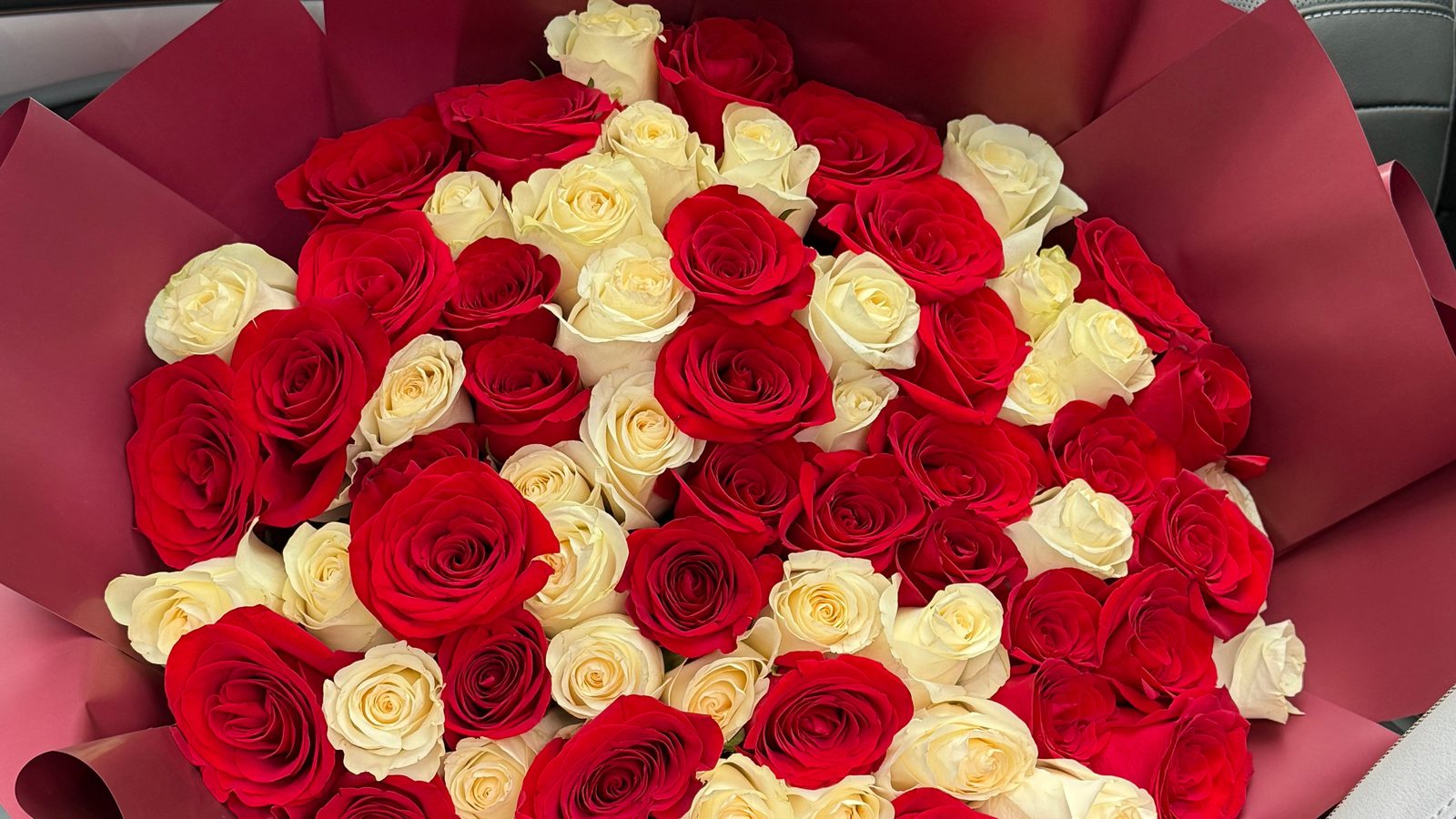 Bouquet of 70 red and white roses